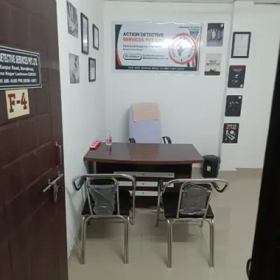 Private Detective Agency in Lucknow - Action Detective office with Banner, Table, Awards, Certifications, Brown Door and chair visible.